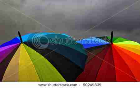 stock-photo-rainbow-umbrellas-under-storm-clouds-50249809.jpg